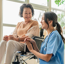 asian-young-caregiver-caring-her-elderly-patient-senior-daycare-handicap-patient-wheelchai