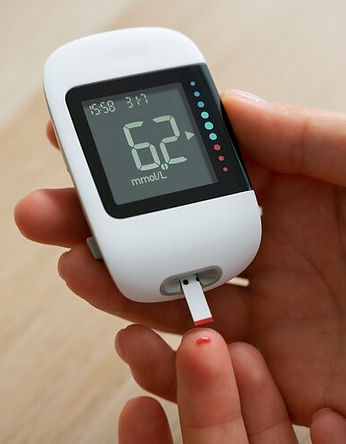 top-view-diabetic-woman-checking-her-glucose-level_23-2150756365 (1).jpg