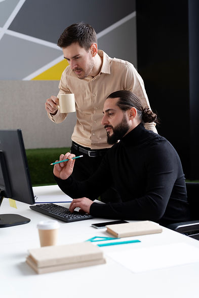 medium-shot-men-working-together-office.jpg