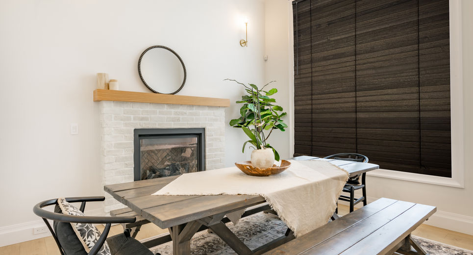 Modern country style dining area with wood blinds for privacy and decor in a Bergen County, NJ dining room