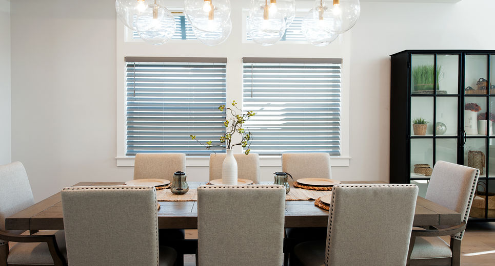 Dining room with wood blinds curtains, and chandelier in a beautiful modern NJ dining room