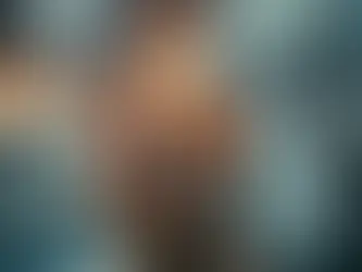 AI generated image of a pair of hands holding a single candle in a raging storm