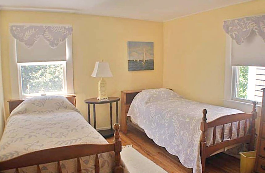 two person bedroom with two twin beds