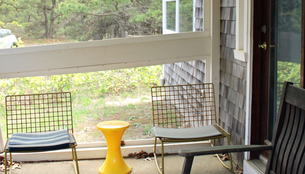 screened in porch seating area