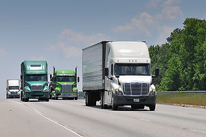 Trucks-in-a-row-on-the-highway.jpg