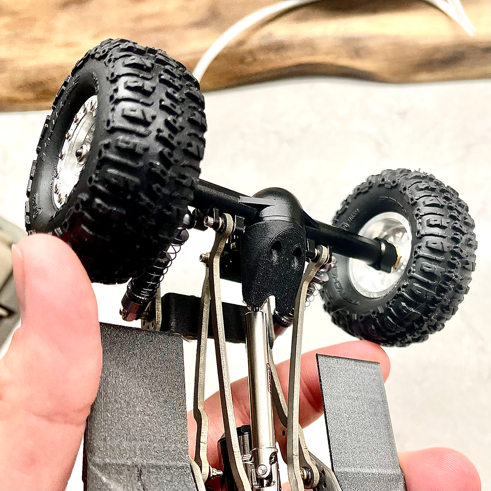Thumbnail: SCX24 crawler diff protection slider close up