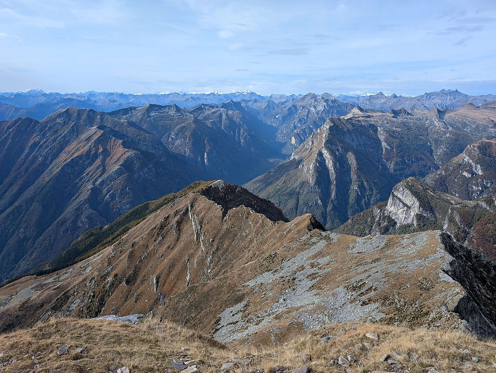 The Alps of Switzerland and Italy in full view. :) You also can see the first part of the descent along the ridge to the very right