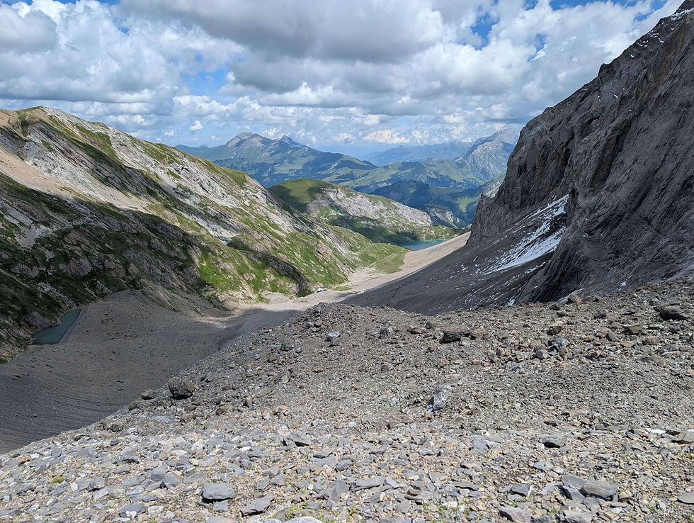 The hut is right in the middle of the picture and can be seen fairly well. :) The lake in the back is Lake Iffigen