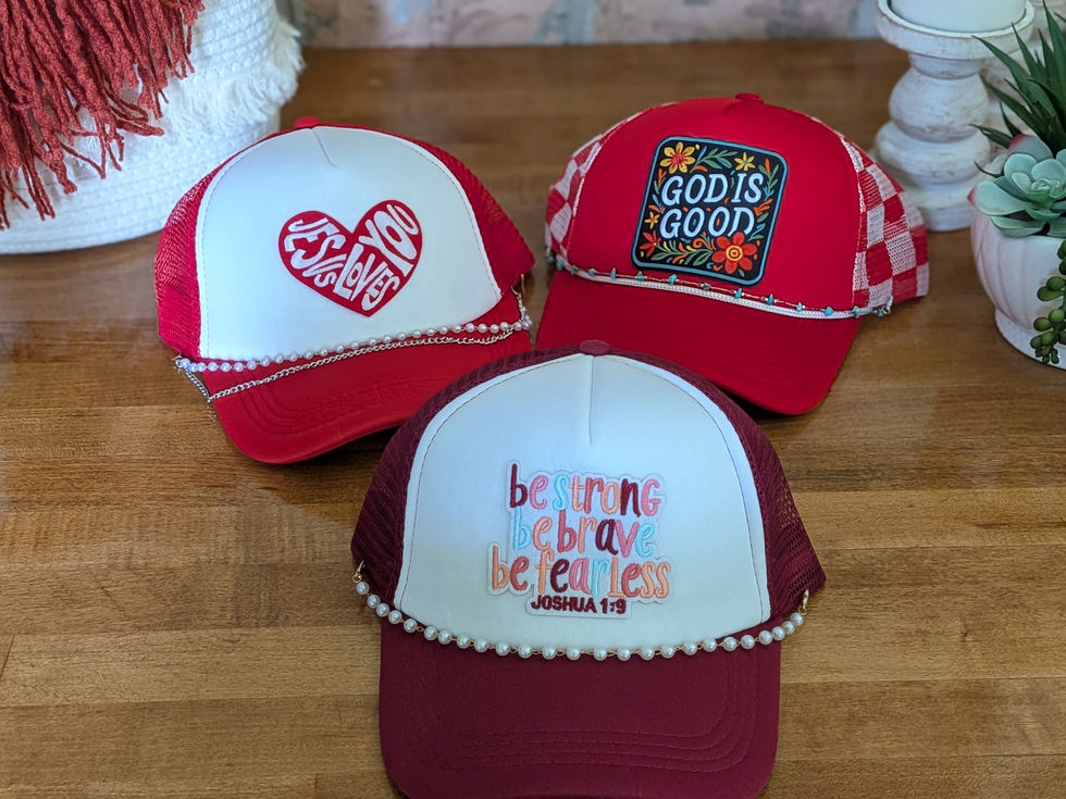 5 Trucker hats, with patches and embellished with decorative chains across the brims.
1 red, reads: Jesus loves you.
1 burgundy, reads: Be strong, be brave, be fearless, Joshua 1:9.
1 bright orange, reads: grateful and blessed.
2 yellow, reads: Howdy and A friend loves at all times.