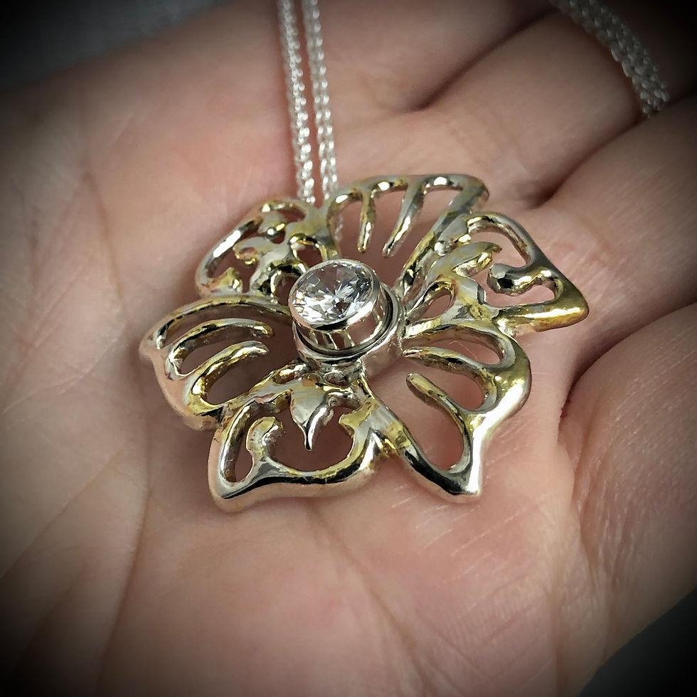 Thumbnail: Silver & Gold Hibiscus White Brillant Cut Topaz Pendant