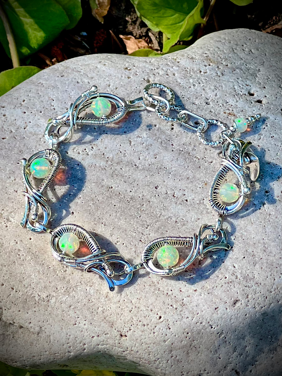 Thumbnail: Handmade Silver Welo Faceted Opal Wire Wrapped & Sculptured Bracelet