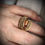 Thumbnail: Gold Sunstone Ring with Welo Opal weaved in band