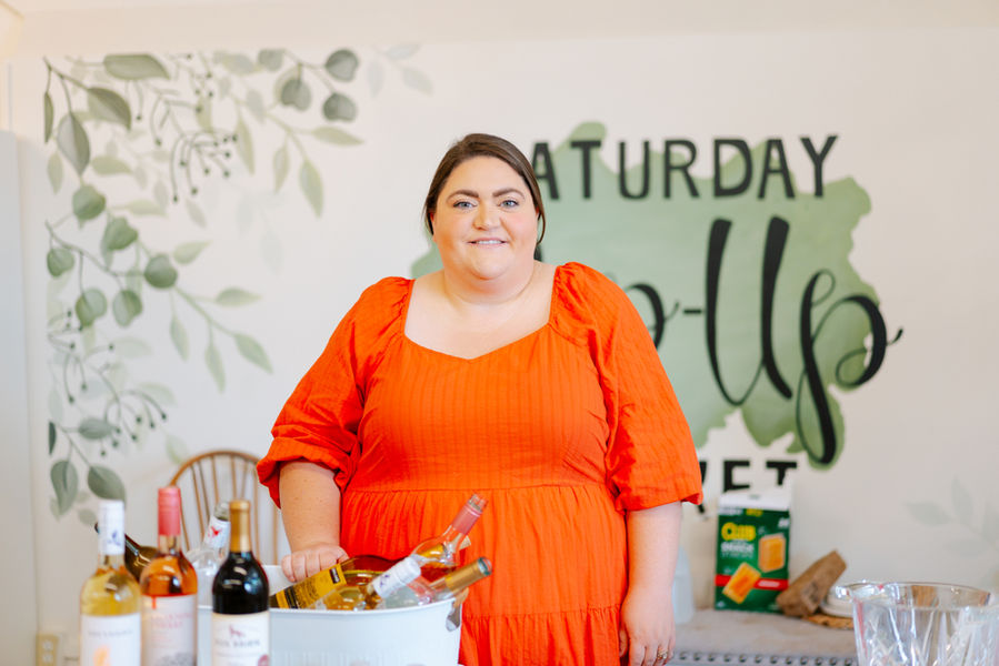 Business owner welcoming you to Uptown Lexington