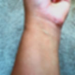 underside of a woman's wrist showing her skin's undertone