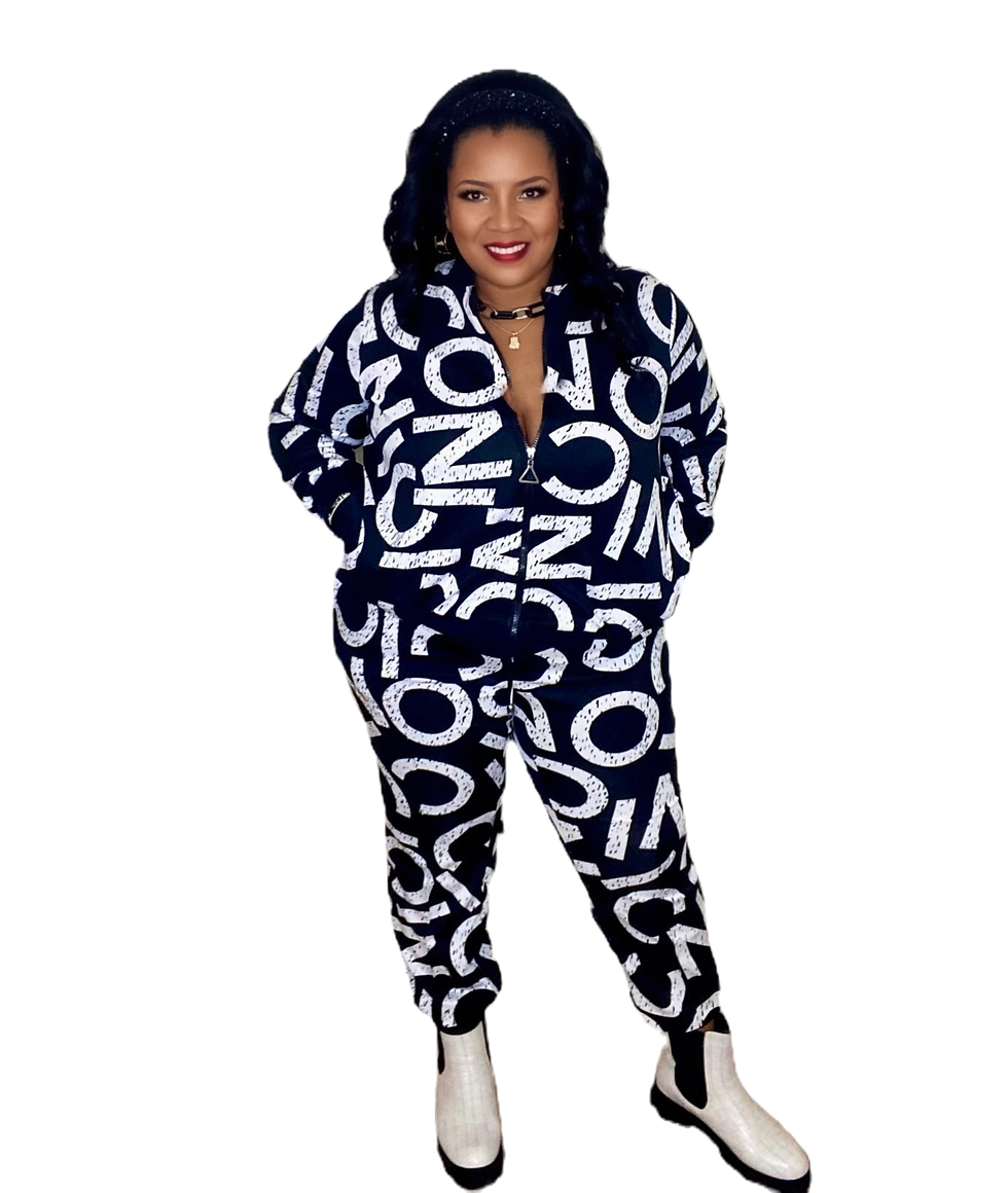 a woman wearing mary kay red lipstick and plus size Ashley Stewart ICONIC Scuba Leisure suit