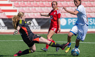 Goalkeeper tackling player