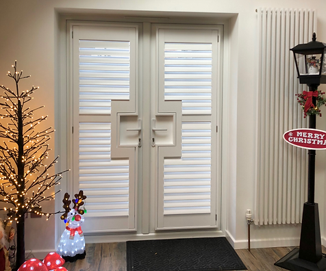 Bespoke shutters on uPVC doors.jpeg