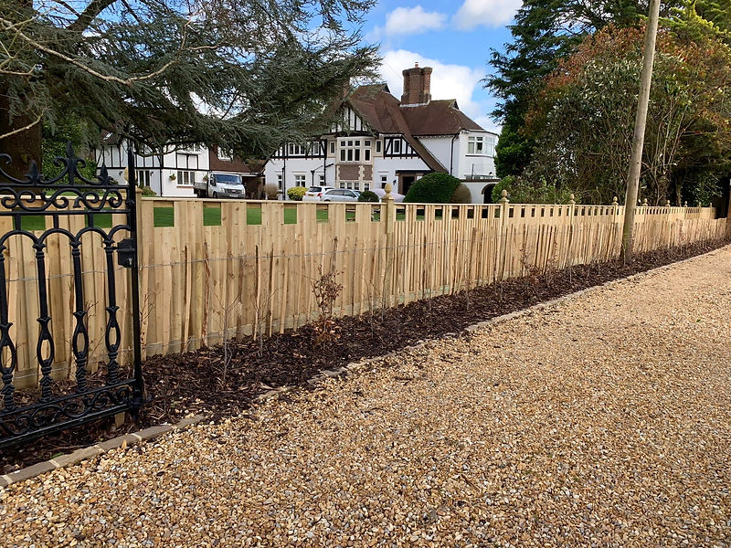 Decorative wooden fencing in park