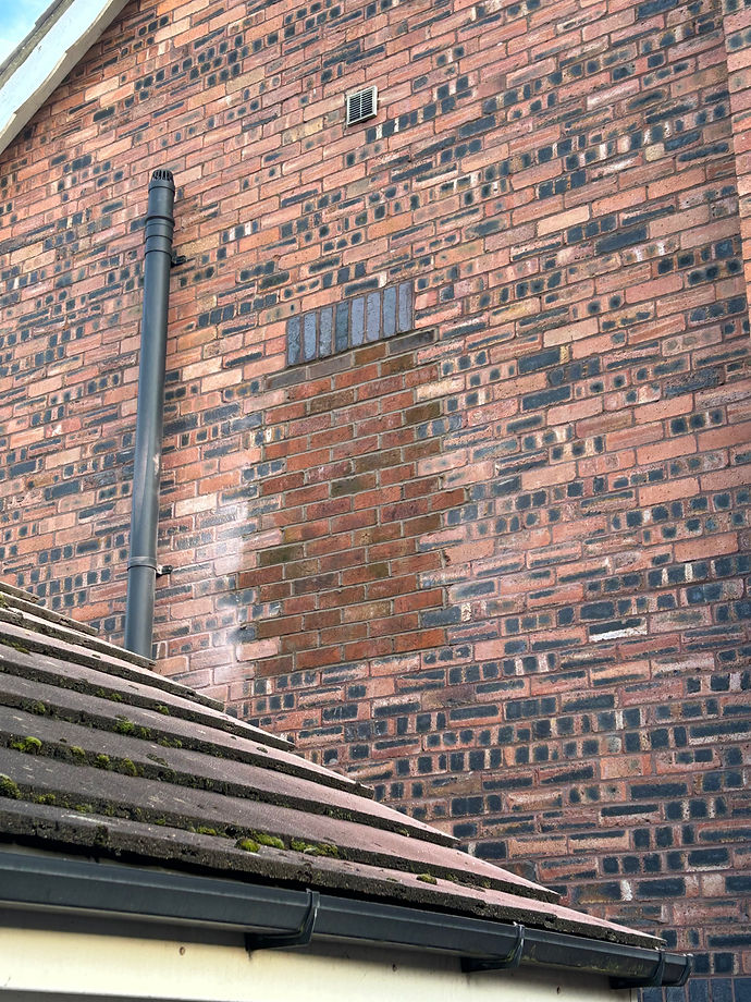 Repointing brickwork after removing window