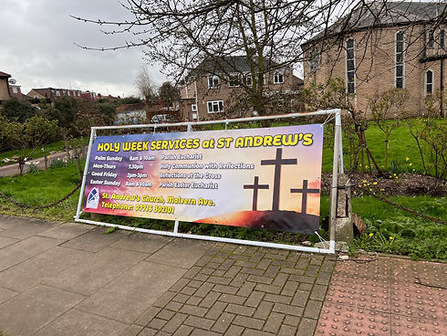 Large printed sign for church
