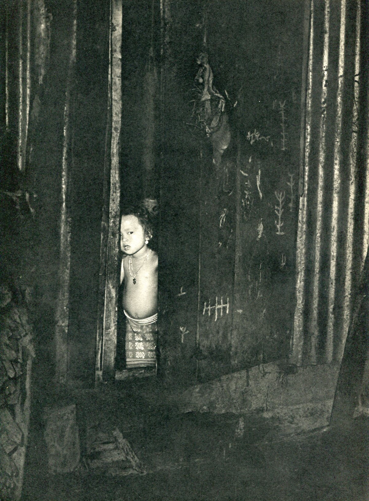 K F Wong - Borneo - Peeping Iban Child