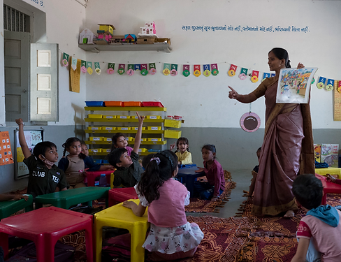 Teacher teaching kids at school