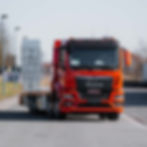 Arbeitsbühnentransporter in Orange Frontansicht