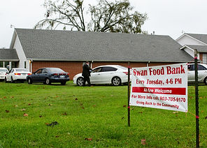 Swan Wide Shot of church and cars.jpg
