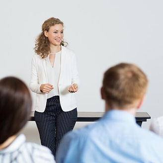 business-woman-giving-lecture_1262-804_edited.jpg