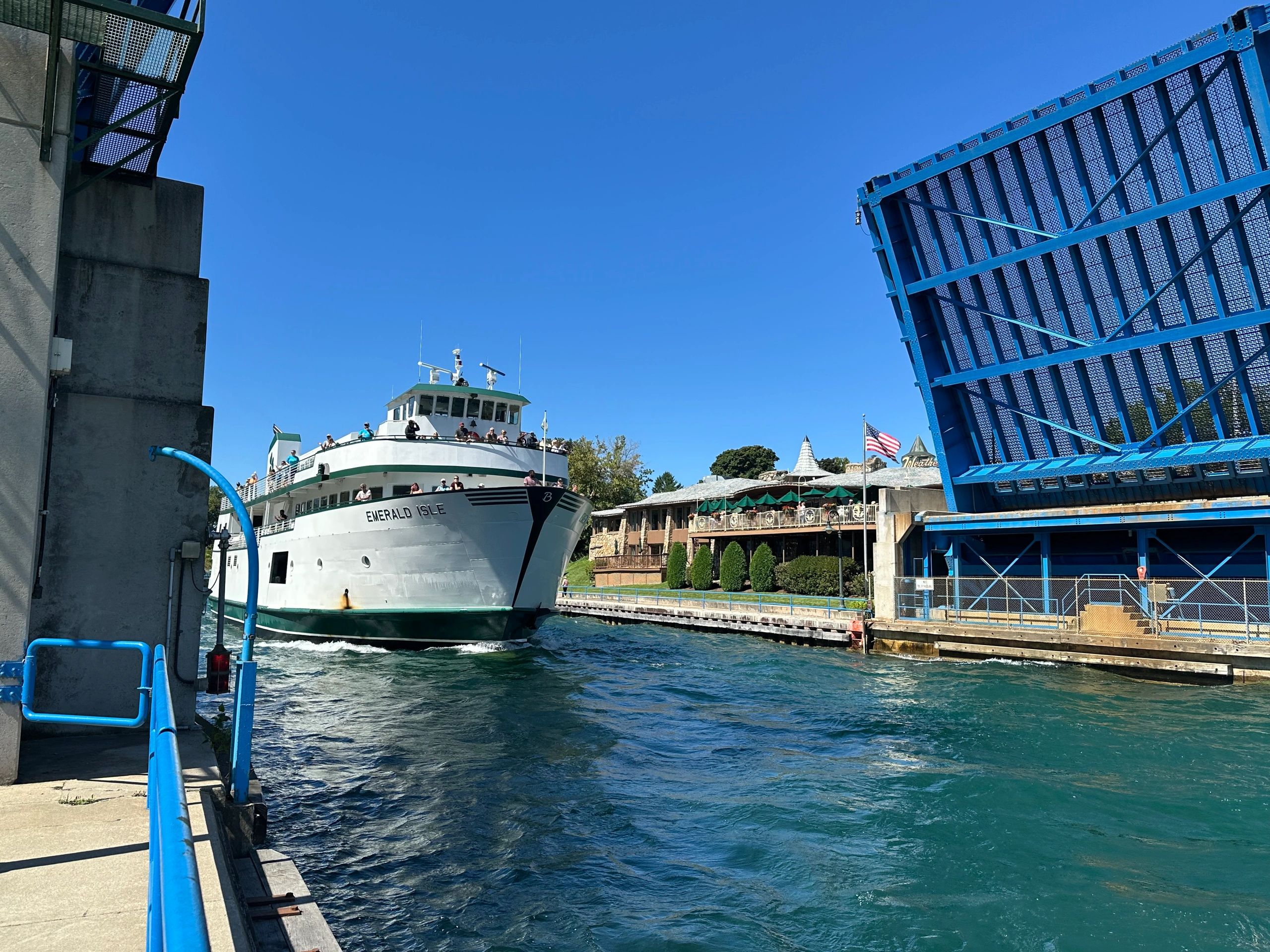 Lift bridge operates once an hour to let taller boats/ships pass between Lake Michigan and Lake Charlevoix