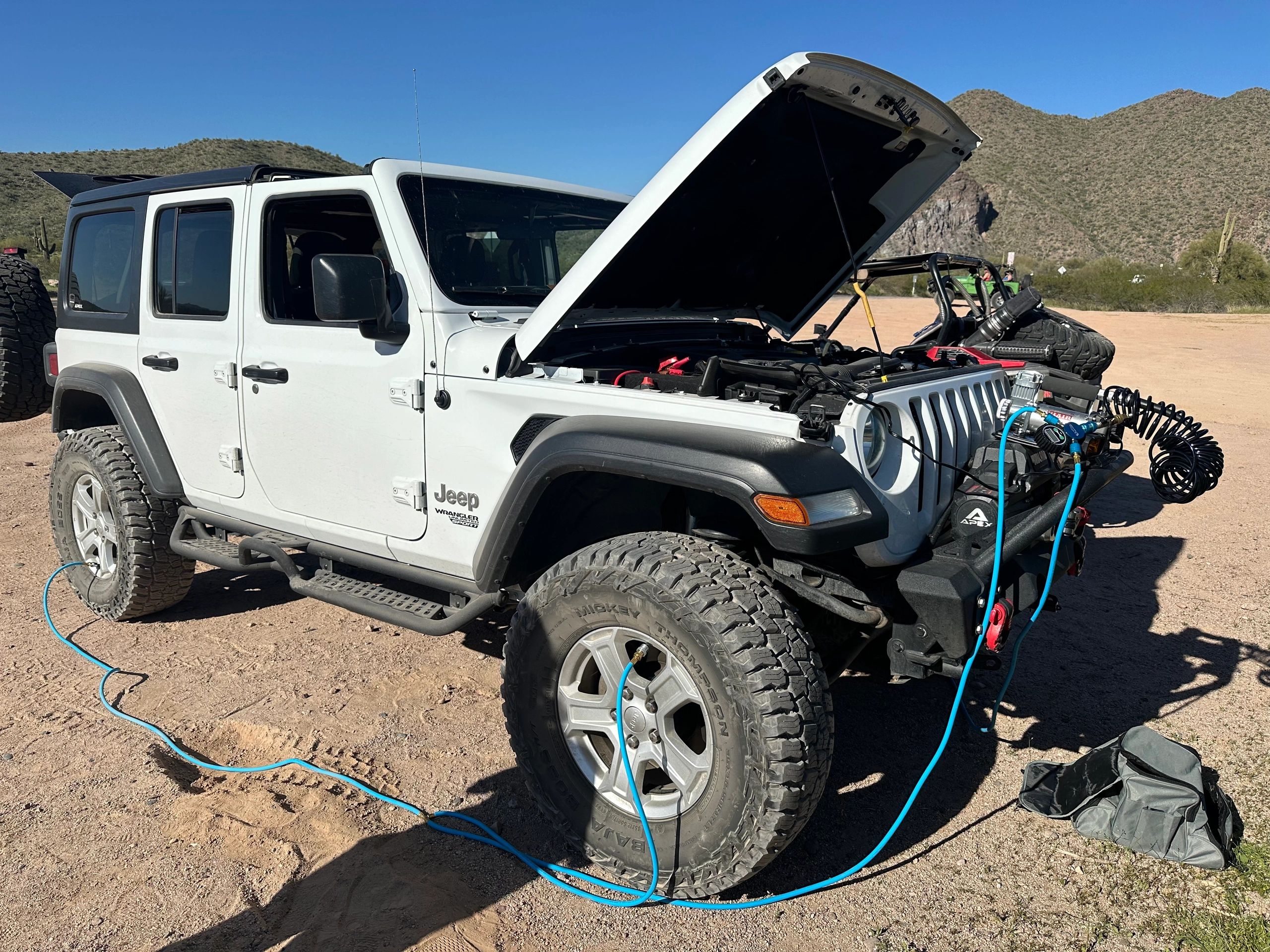 Look at our sweet setup. All 4 tires at once with an air compressor!