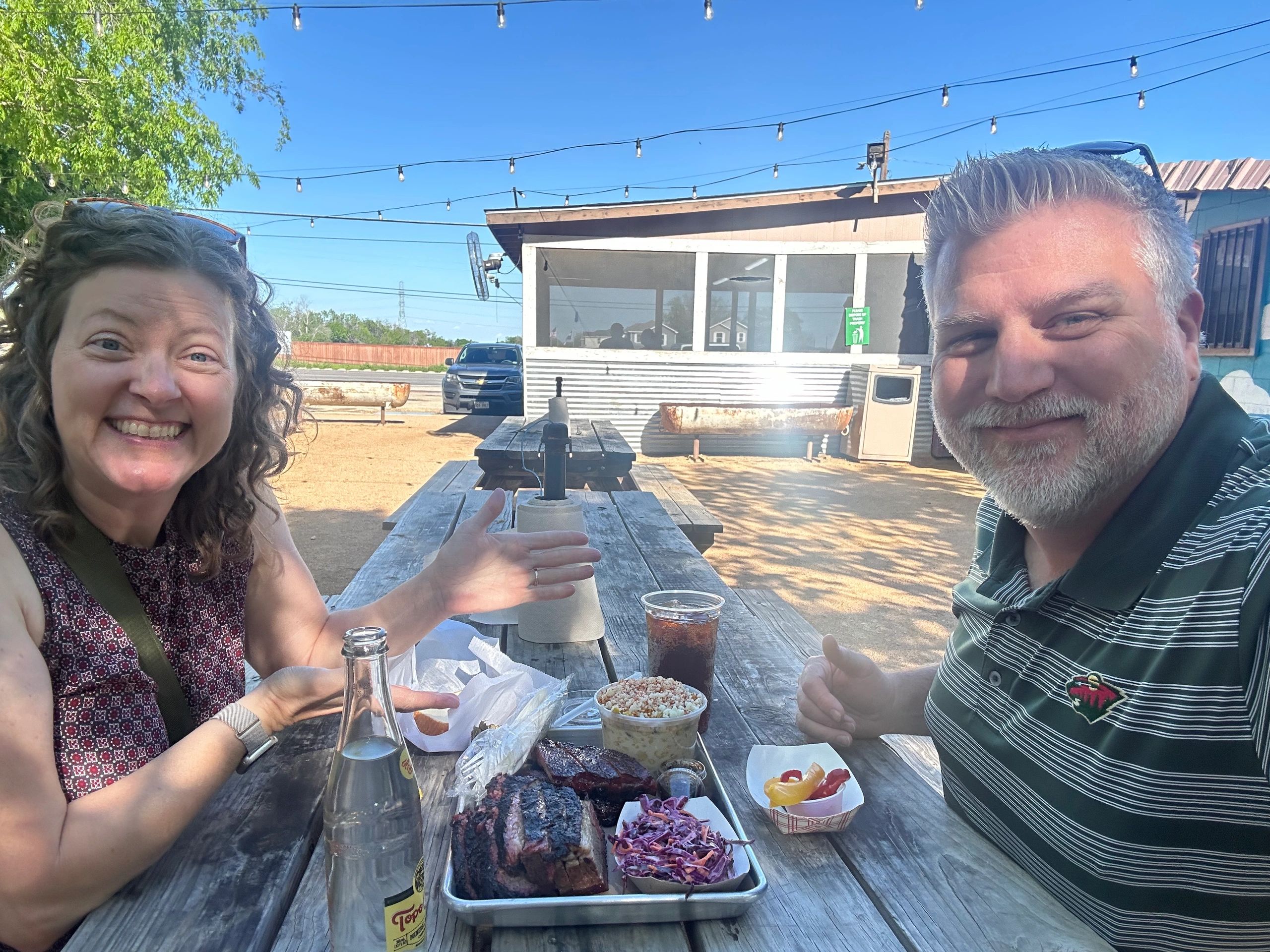Brisket, ribs, Mexican street corn, pickled peppers, and coleslaw. Yum!