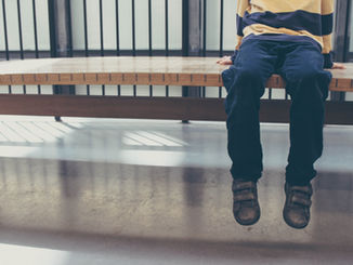 The office dangling feet disadvantage: why it is harder for people to be confident when they sit and