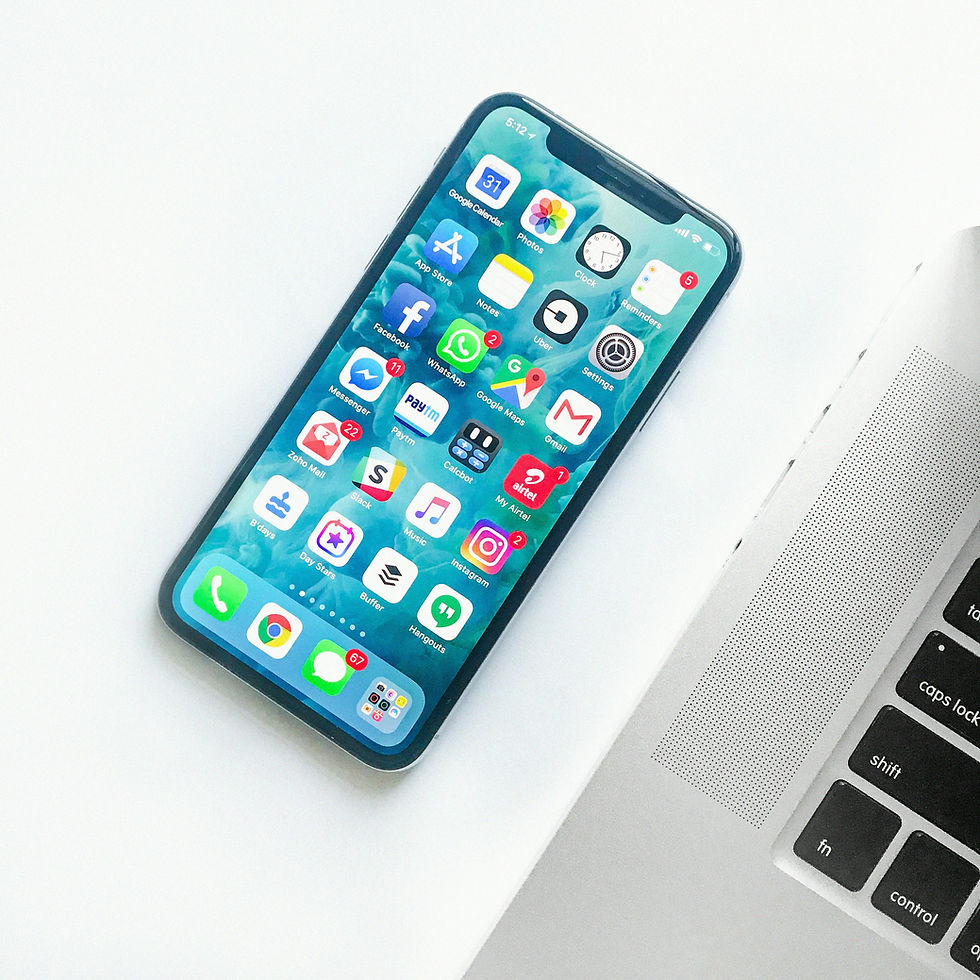 Smartphone and laptop representing augmented reality app development cost planning