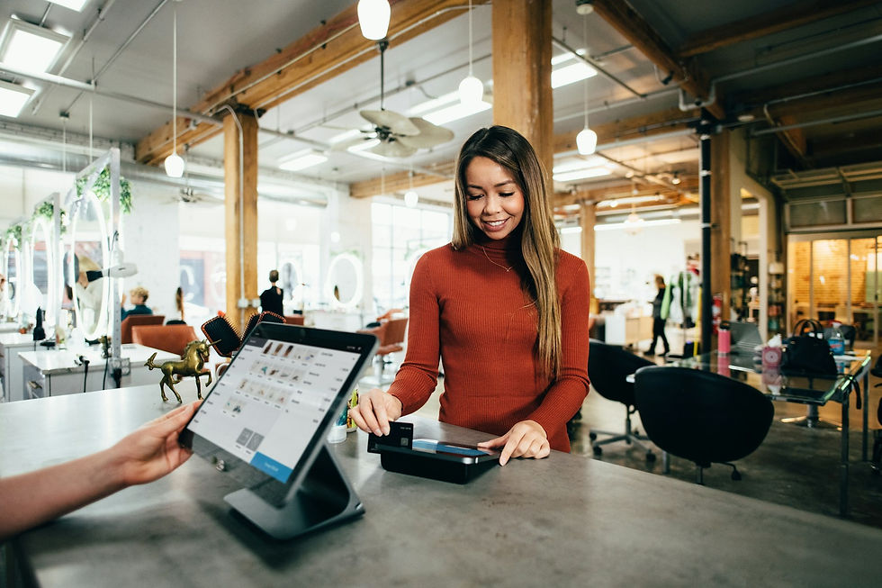 Customer completing a connected retail interaction at a modern checkout