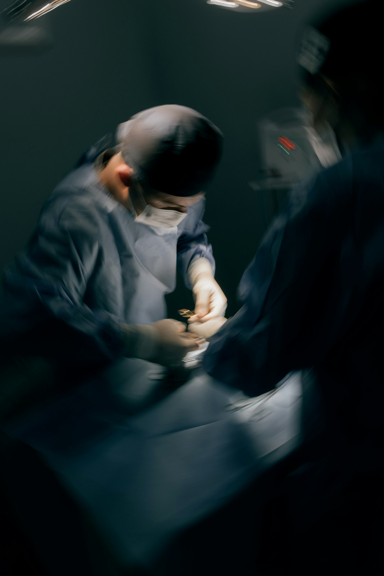Surgical team working in an operating room during a procedure