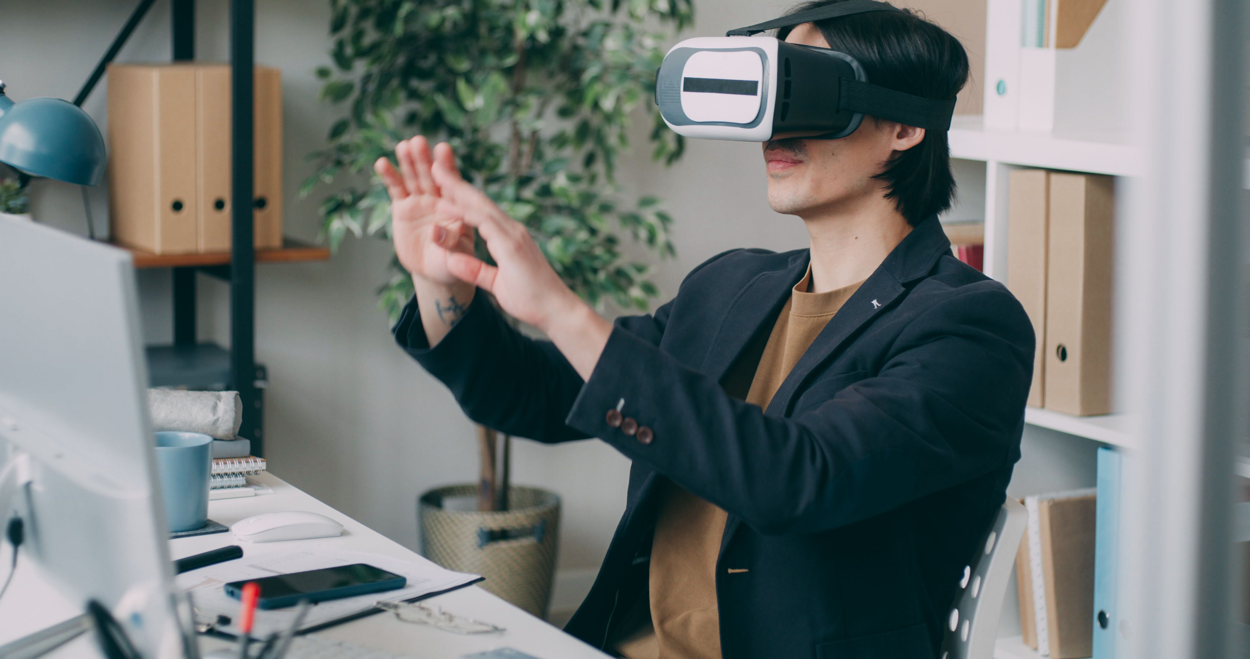 Business professional using a virtual reality headset in an office