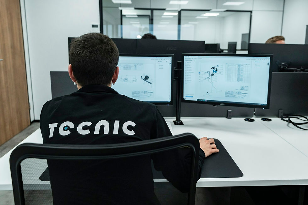 Engineer reviewing technical drawings while planning immersive training