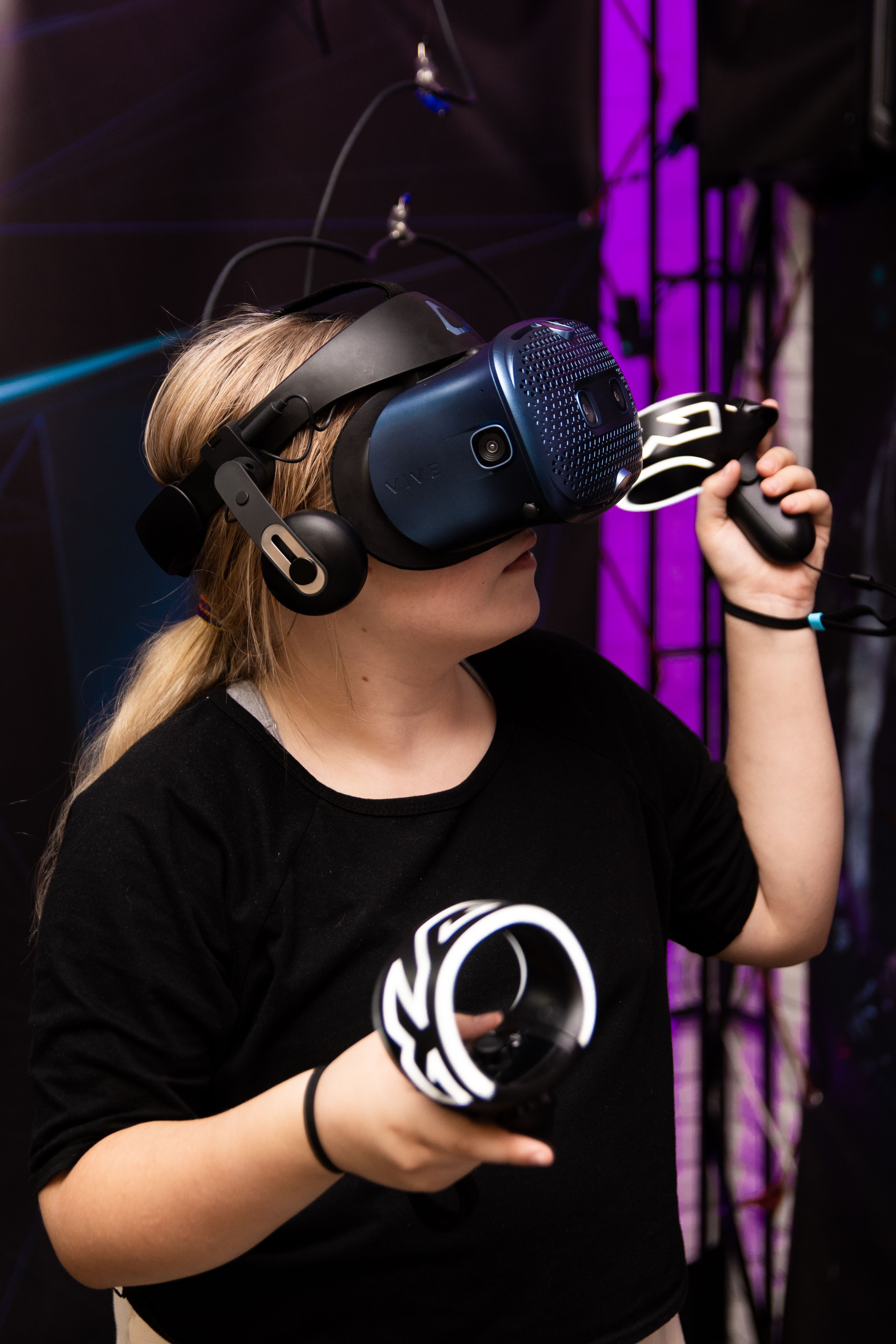 Viewer using a virtual reality headset during an immersive brand experience