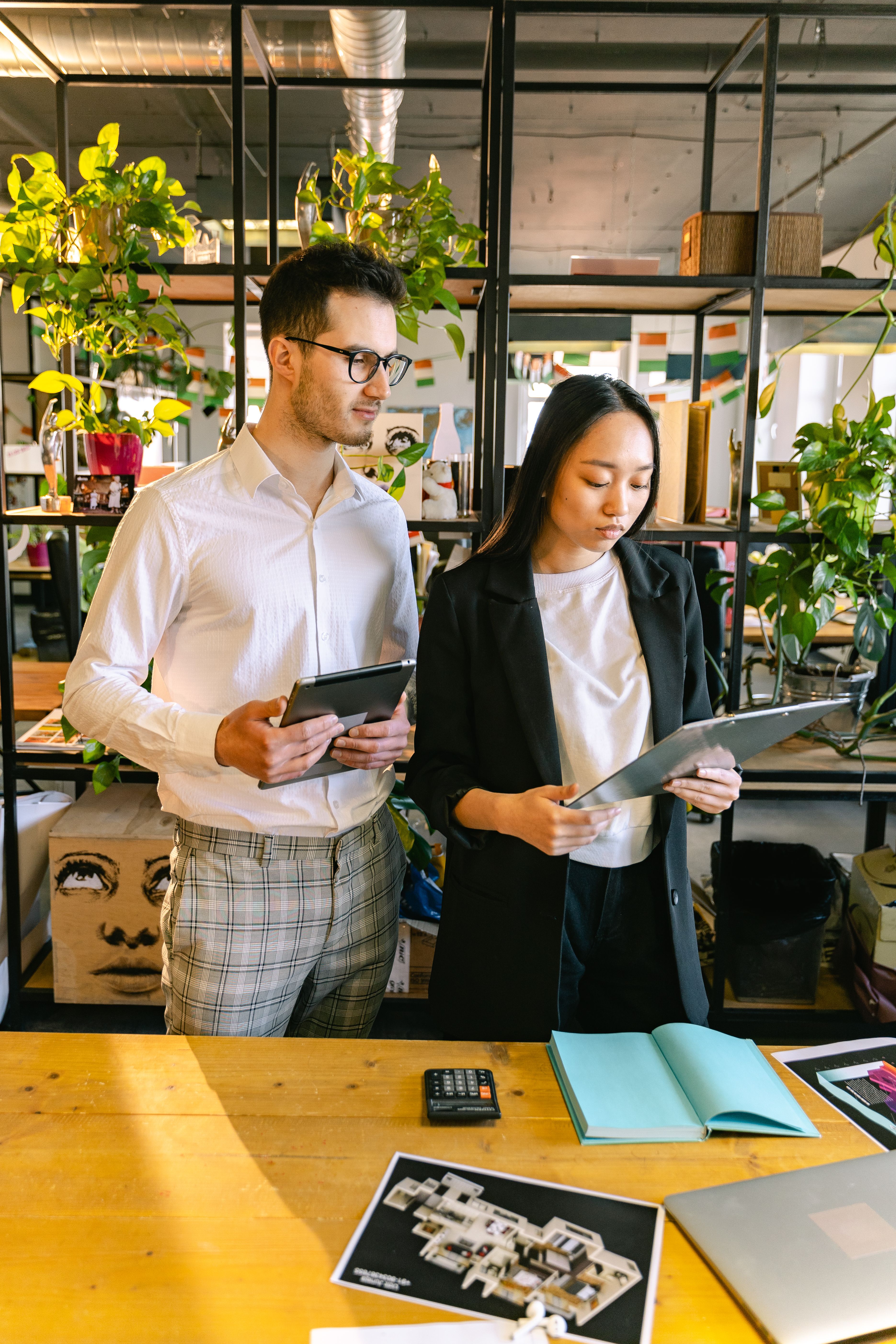 Manager and employee reviewing a customer service scenario and scoring guide