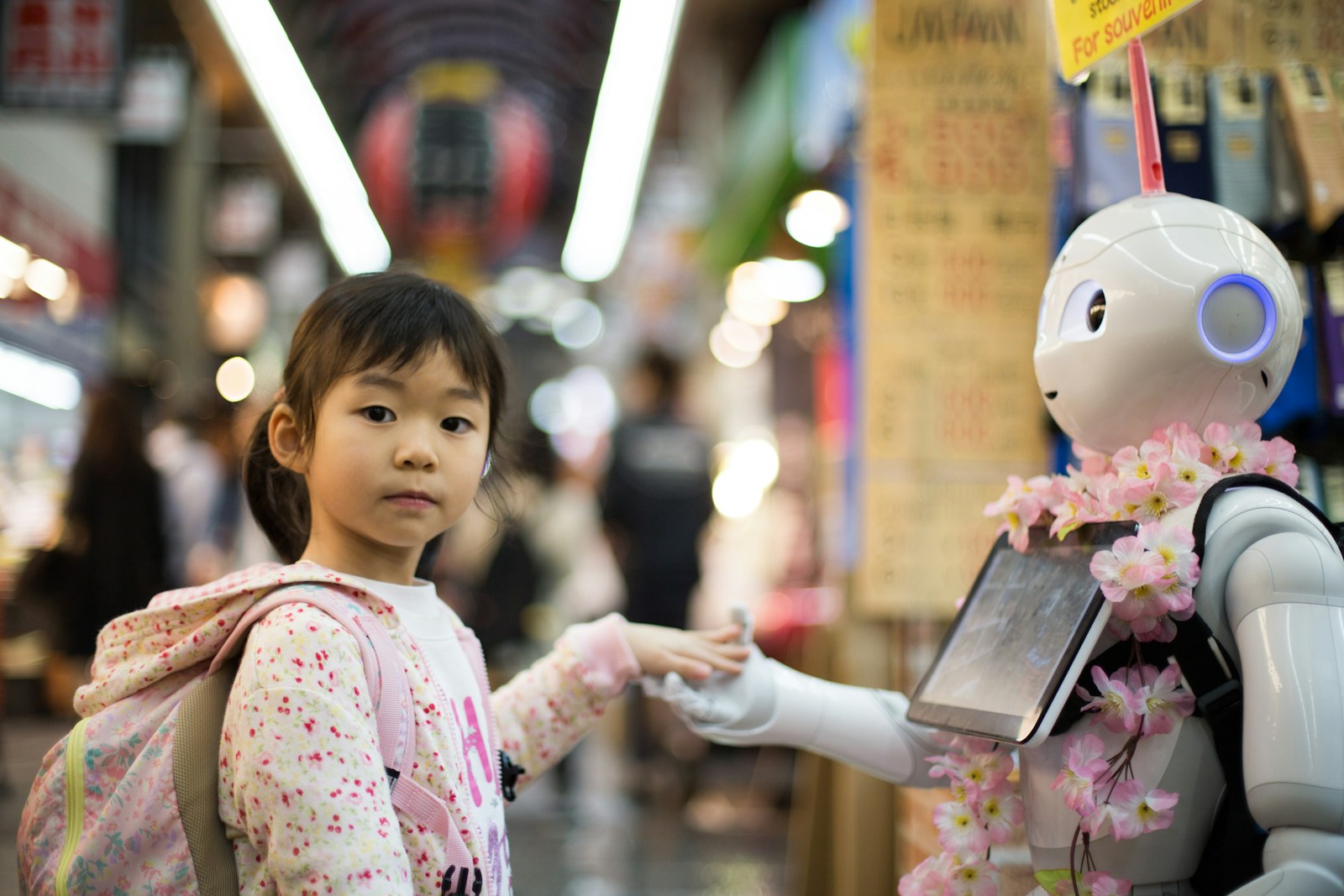 Person interacting with a service robot during human-centered deployment testing