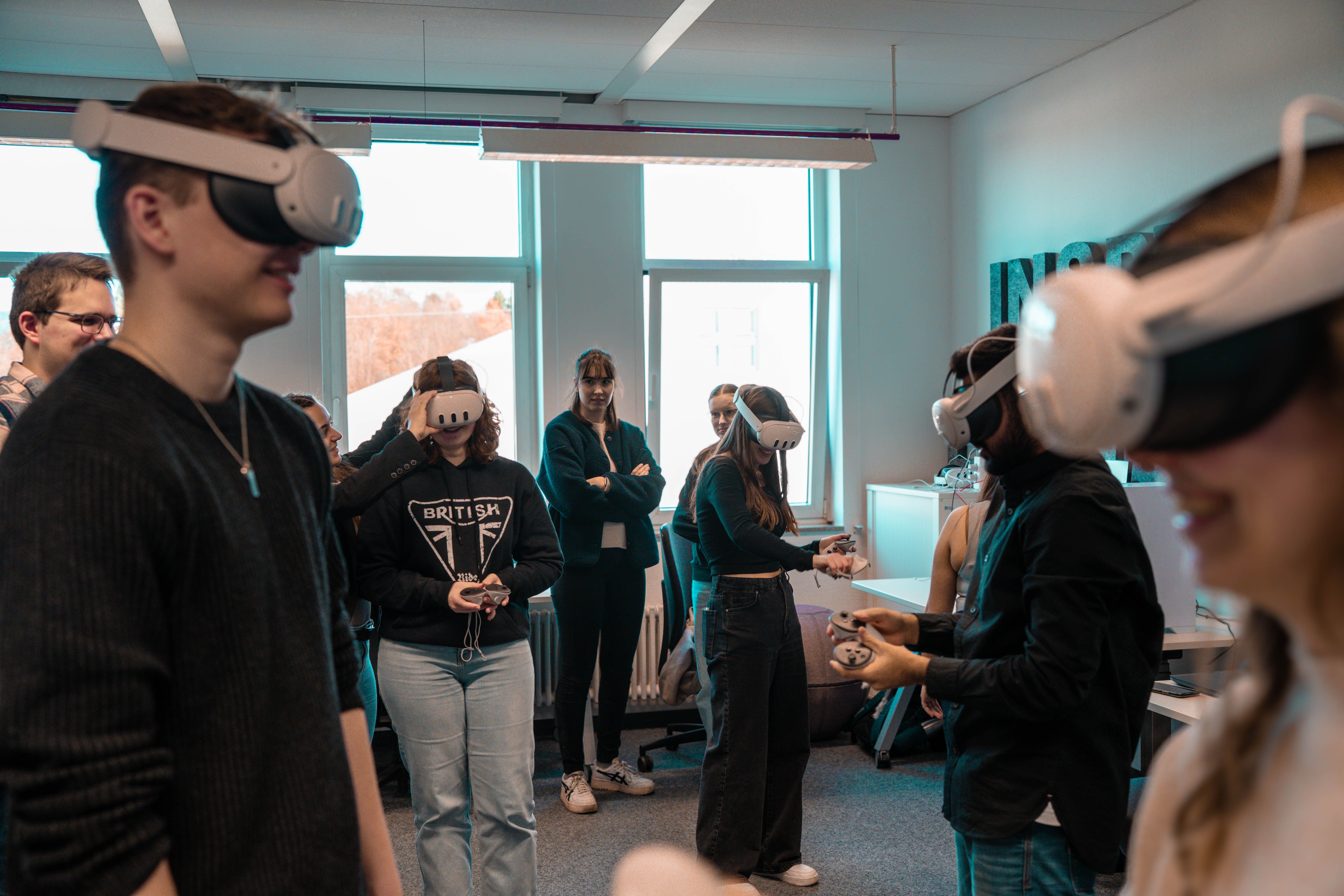 Team member using a virtual headset during a workplace demonstration
