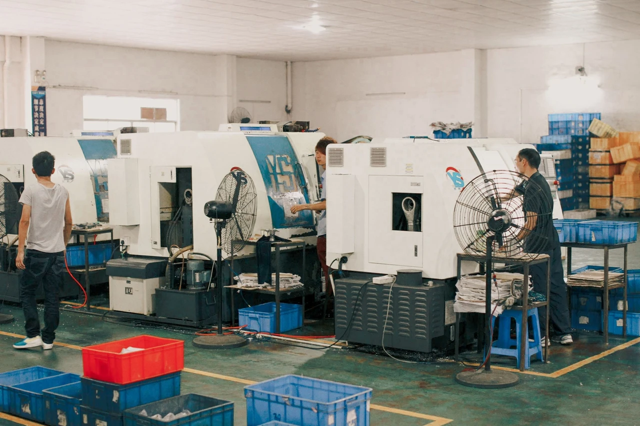 Maintenance team working around factory equipment with digital work instructions