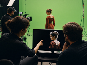 Virtual production VFX crew working on a green-screen and LED stage setup