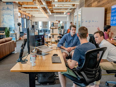 Business team planning a campaign with an AI advertising agency