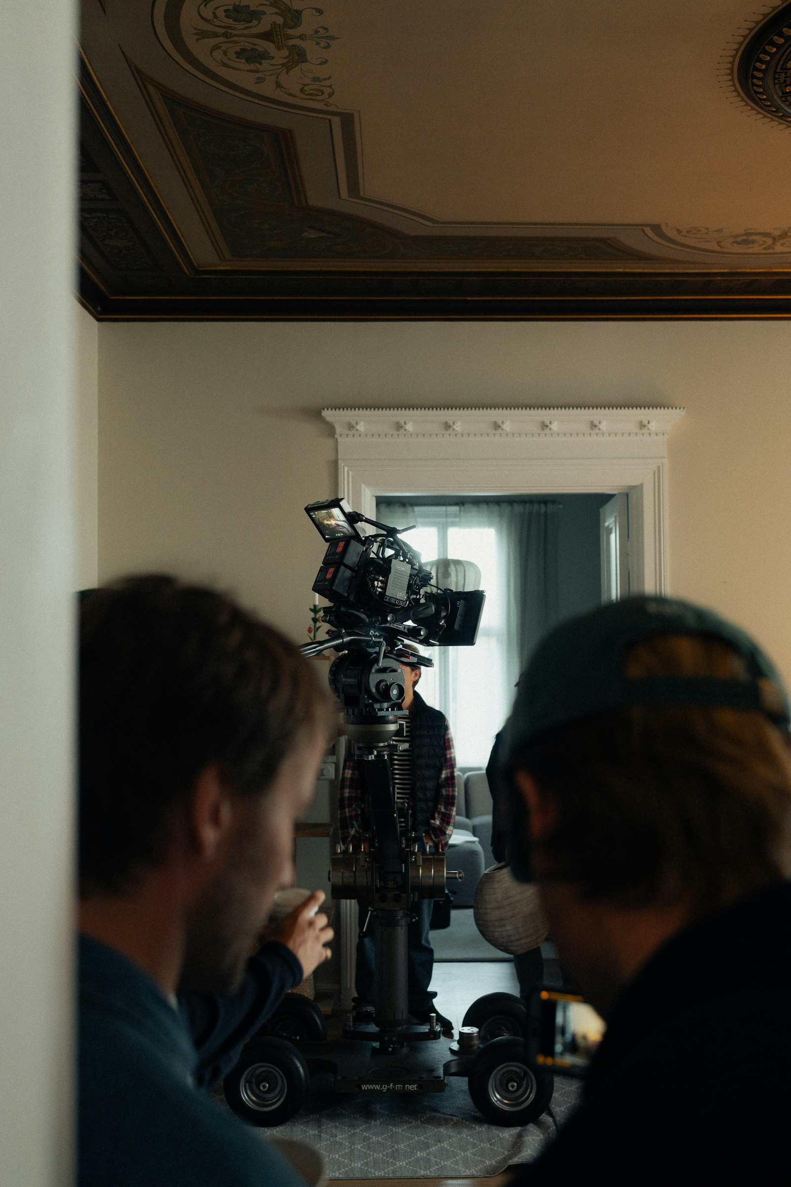 Production team working together on set during a campaign shoot
