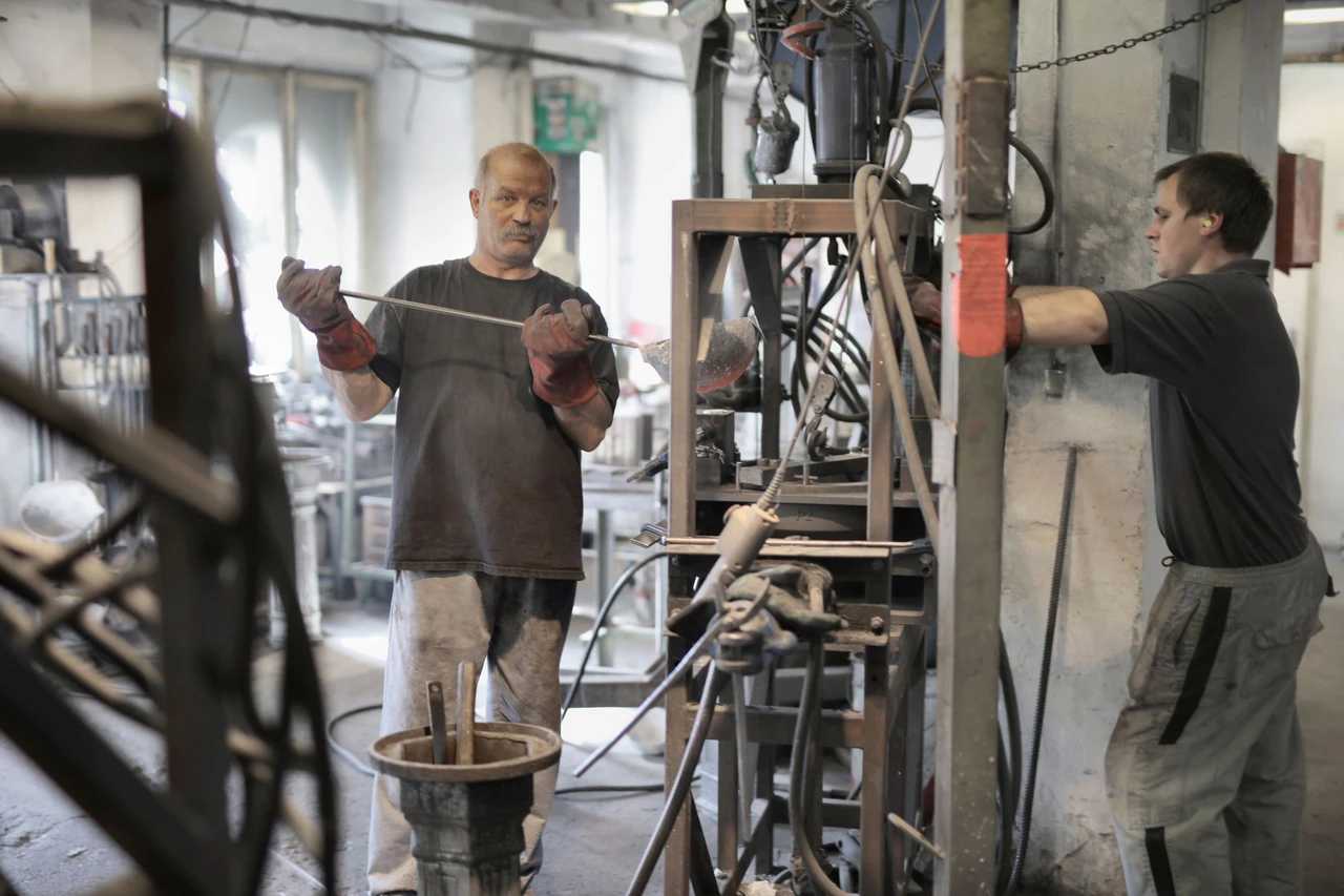 Skilled technicians maintaining factory equipment with contextual guidance
