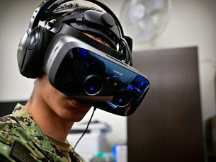 Learner wearing a virtual reality headset during immersive performance training