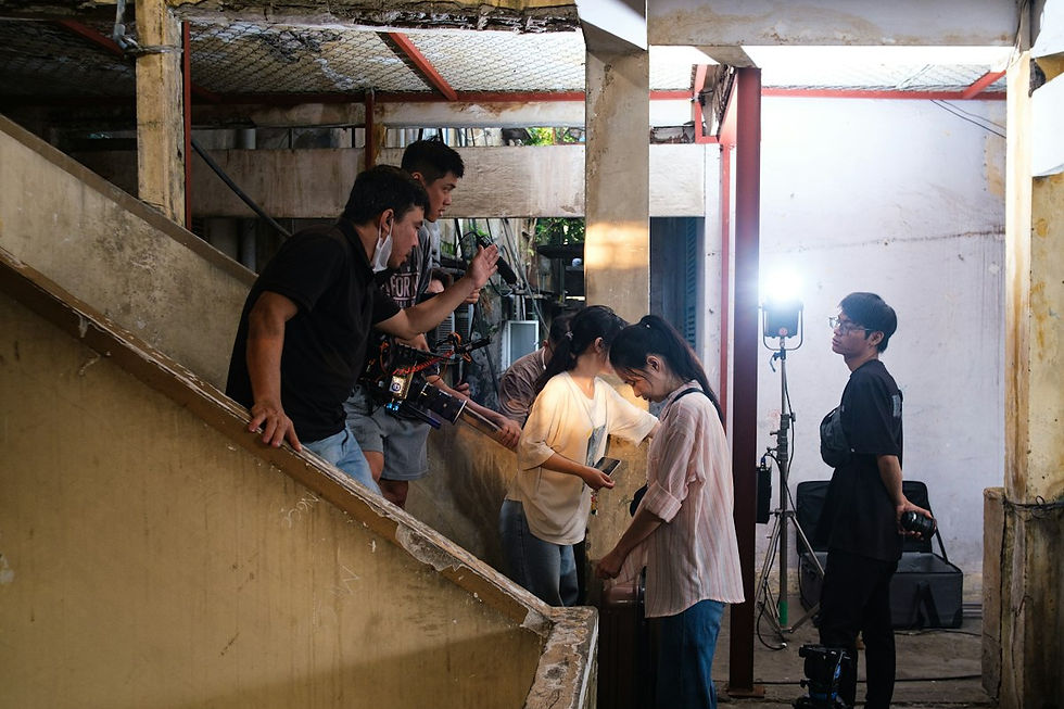 Film crew shooting inside an old building for a location-based visual effects plate