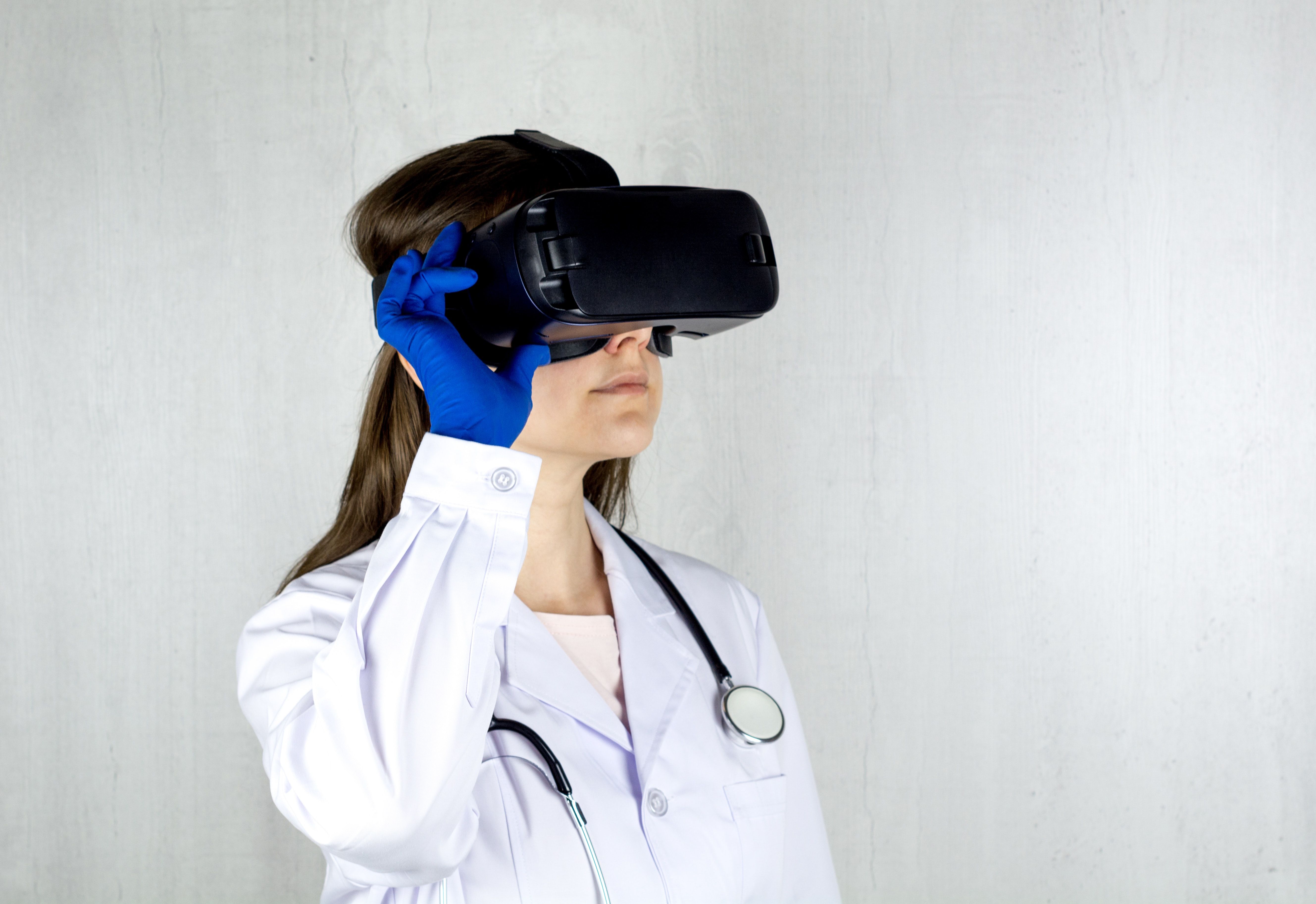 Healthcare professional exploring medical training in a virtual reality headset